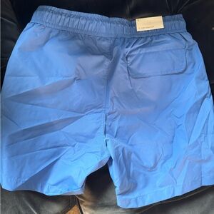 Men’s ONIA brand new 5” blue swim trunks. Small